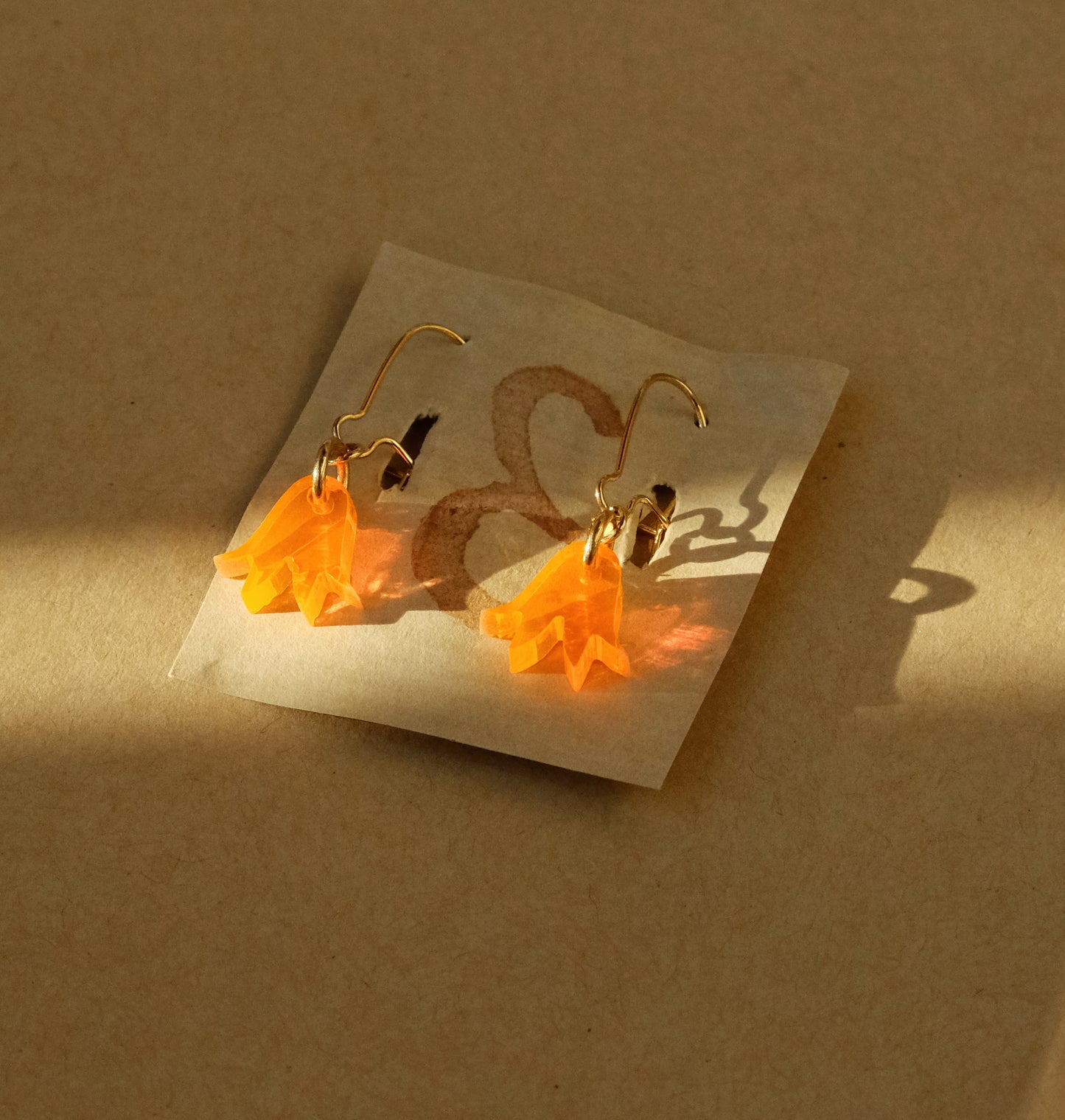 Earrings small orange bluebells gold plated