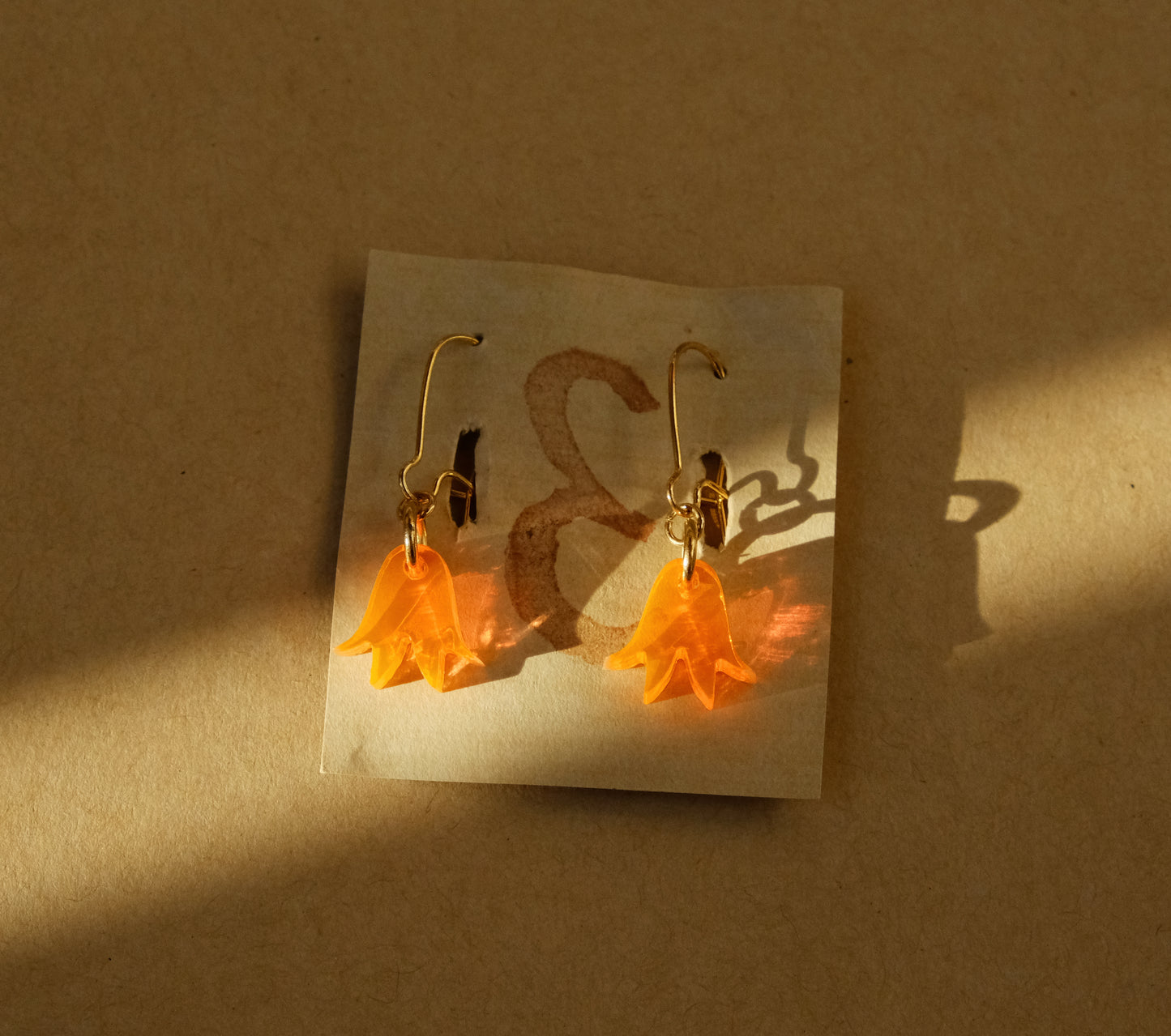 Earrings small orange bluebells gold plated