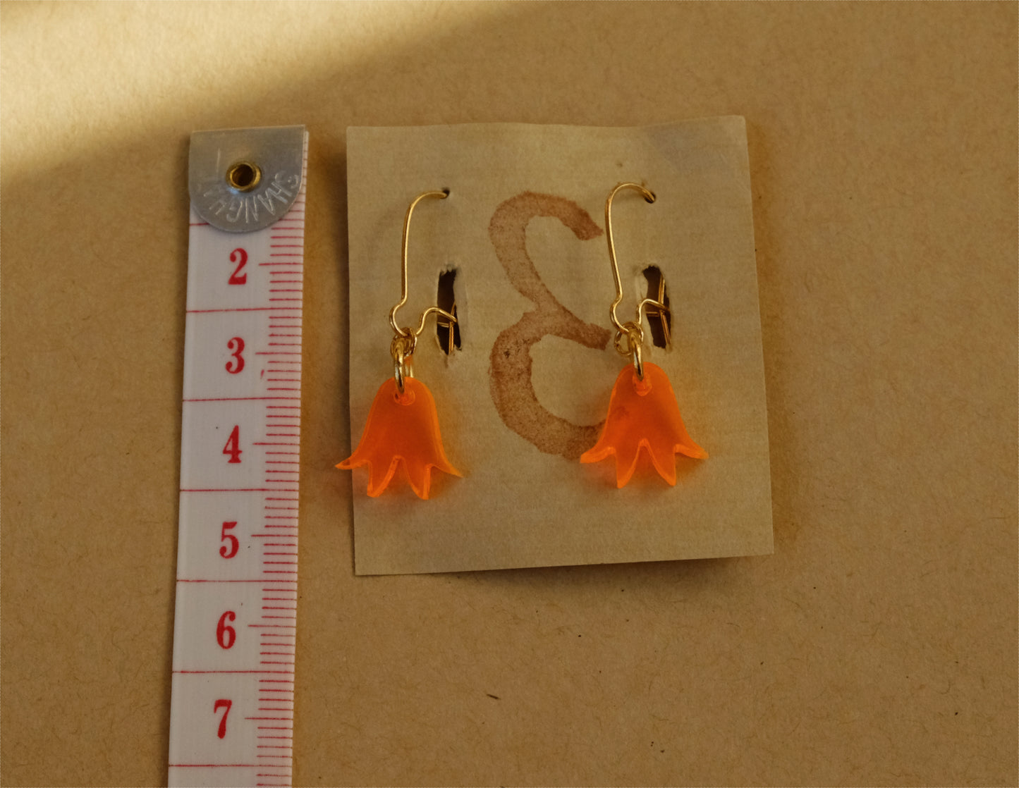 Earrings small orange bluebells gold plated